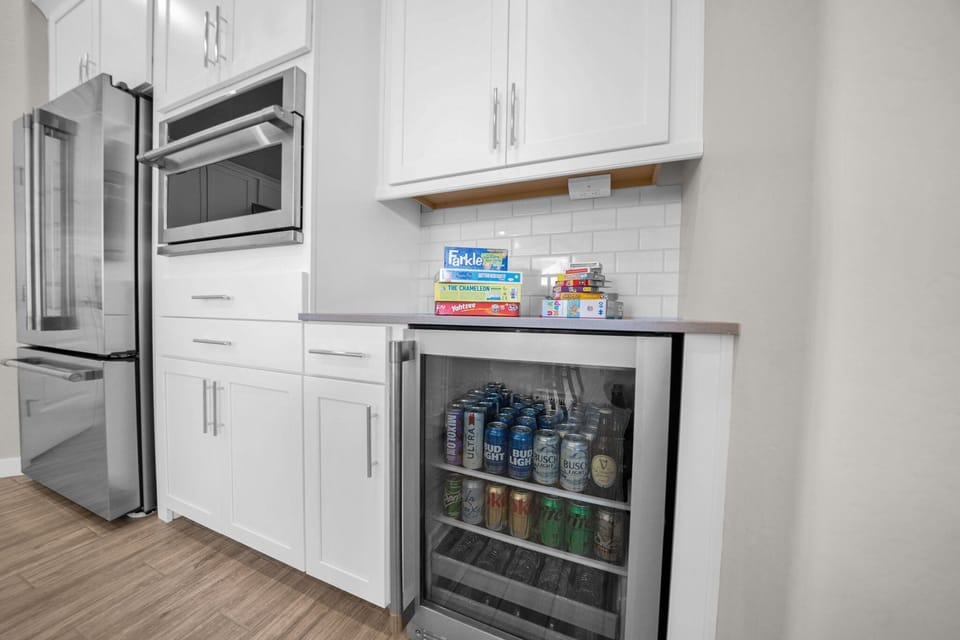 Large stainless fridge and beverage fridge keeps drinks cold on sunny AZ days 🌄