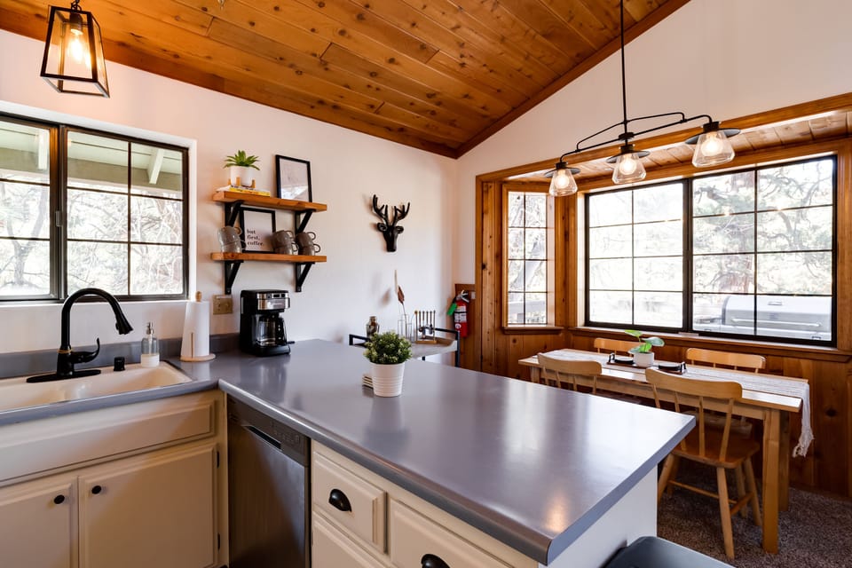 Kitchen peninsula allows for extra seating.