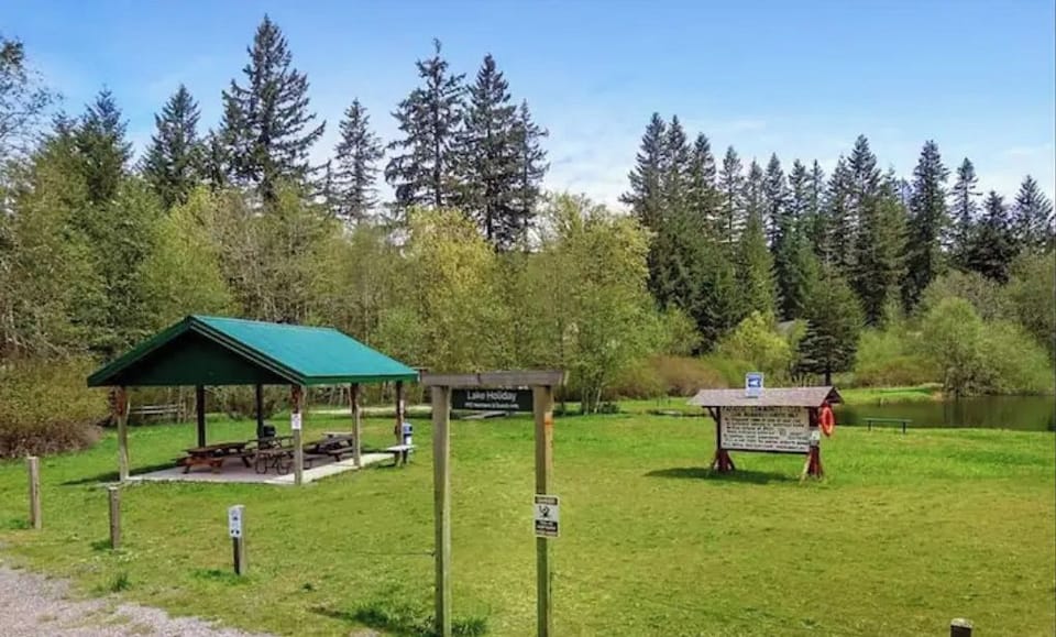Enjoy a picnic at the shelter, just steps from the serene community lake.