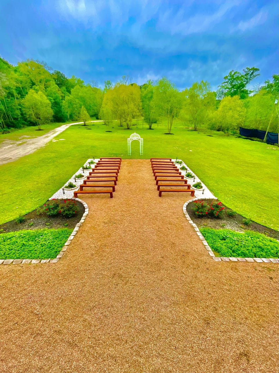 Front yard ceremony patio facing our beautiful willow tree wall.