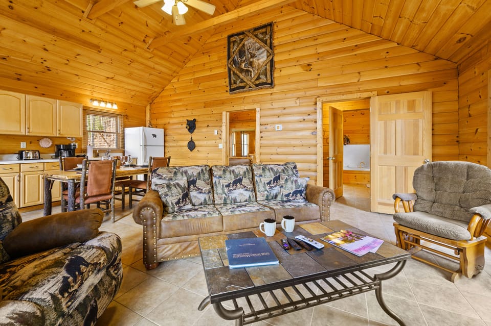 View from living room (Queen sleeper sofa) into kitchen and dining area