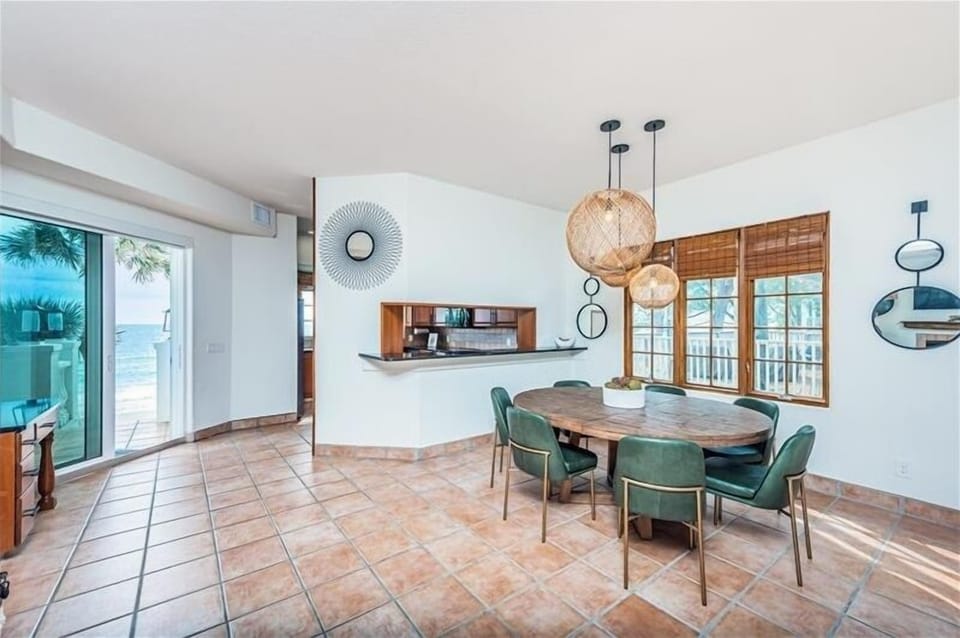 Balcony continuing to kitchen and dining area