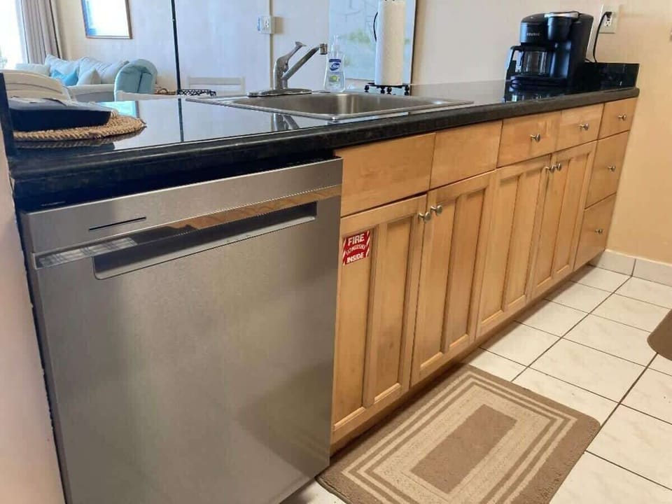You don't need to wash dishes. Let the dishwasher take care of it.