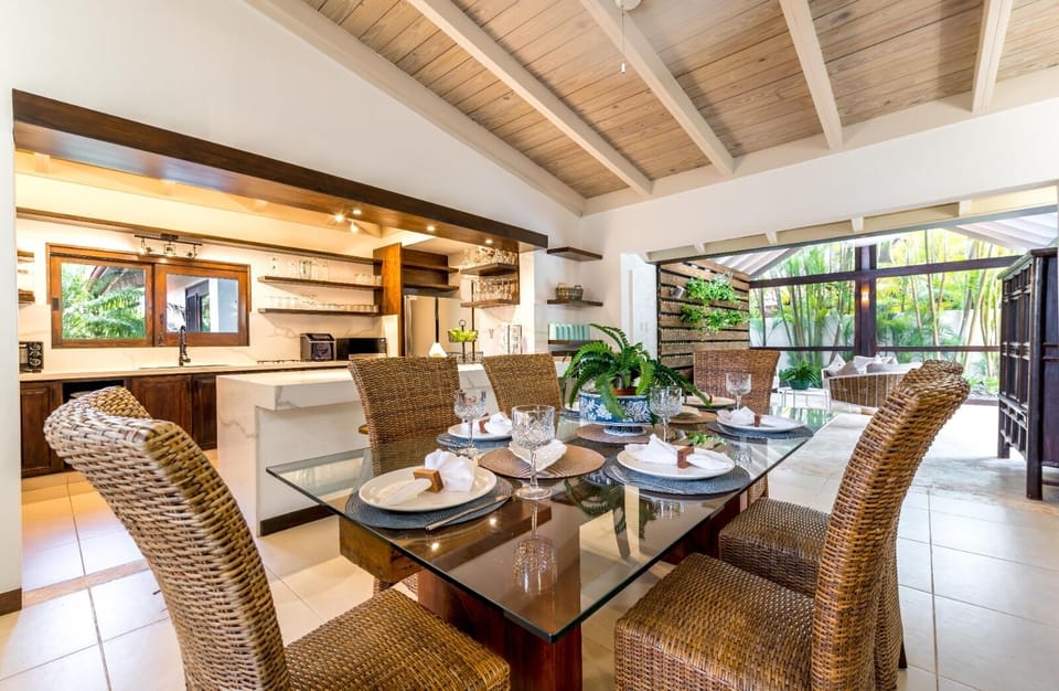 Dining room is situated off of the kitchen between bohio and den/living space