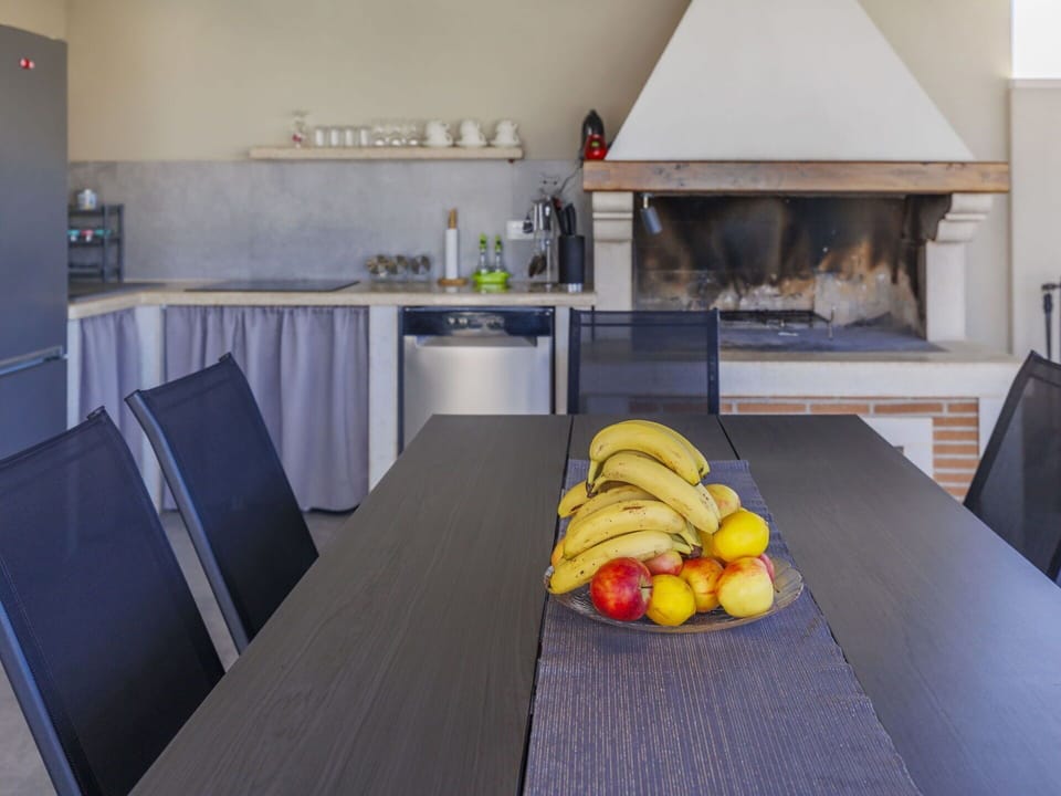 Table, Furniture, Countertop, Cabinetry, Food, Wood, Kitchen, Lighting, Kitchen Appliance, Flooring