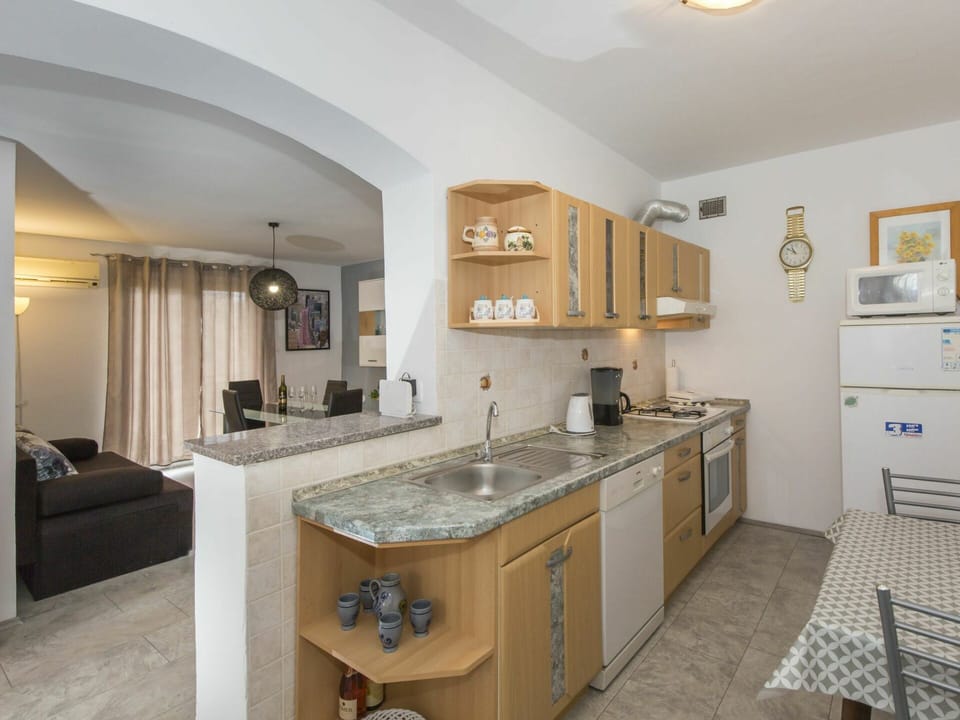 Countertop, Cabinetry, Sink, Furniture, Tap, Kitchen Sink, Kitchen, Drawer, Kitchen Stove, Wood