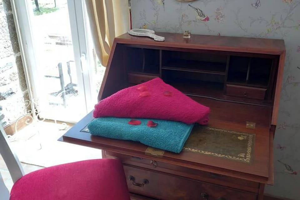 A double bed with patio doors