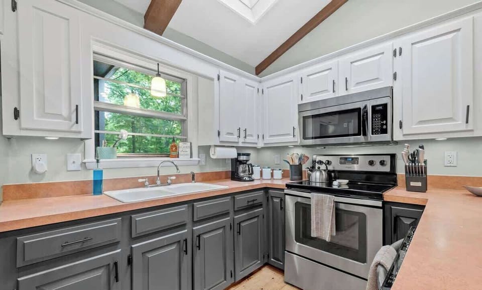 To the left, you'll see our fully stocked kitchen.