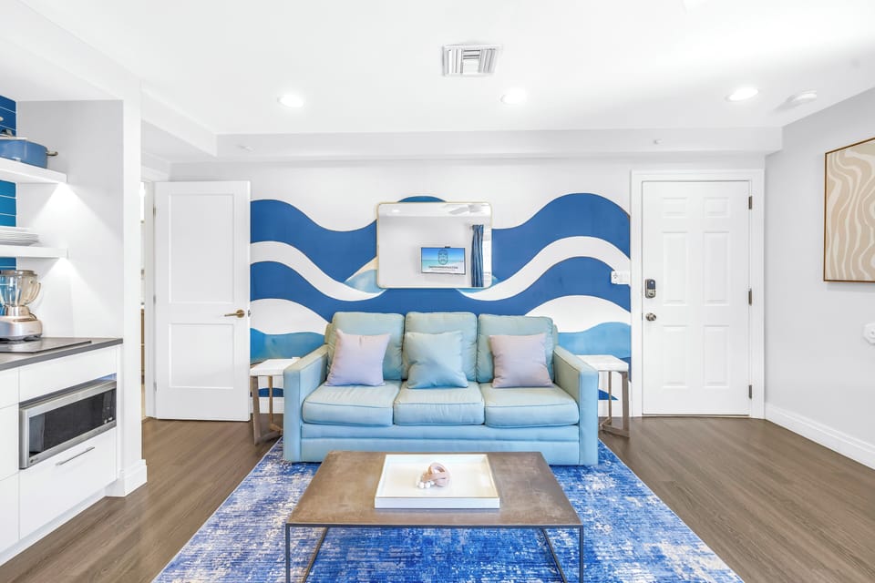 Wave accent wall in coastal living area.