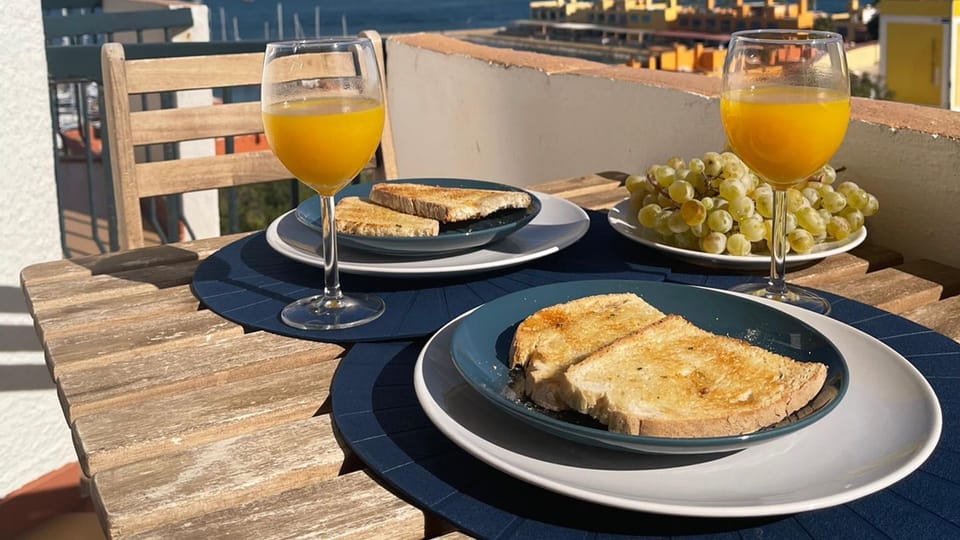 Savor a sun-drenched breakfast on your private terrace, gazing out at the sparkling sea and charming rooftops.
#Terrace #SeaView #LovelyStay