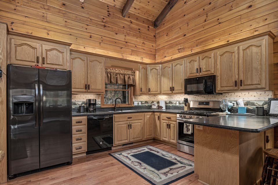 Kitchen with gas stove.