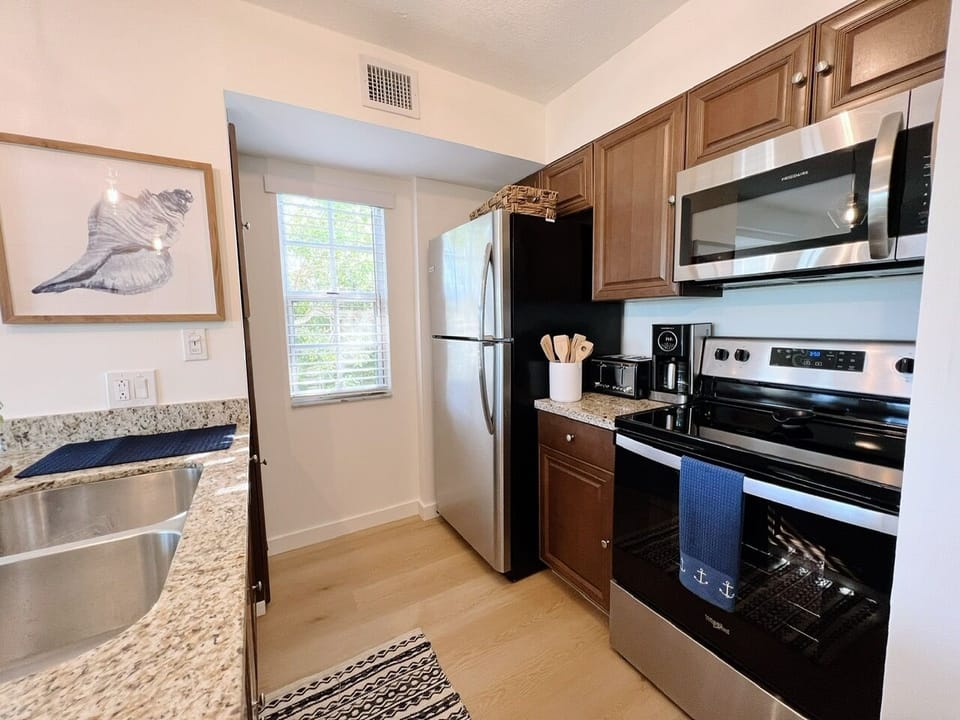 Kitchen with updated stainless-steel appliances