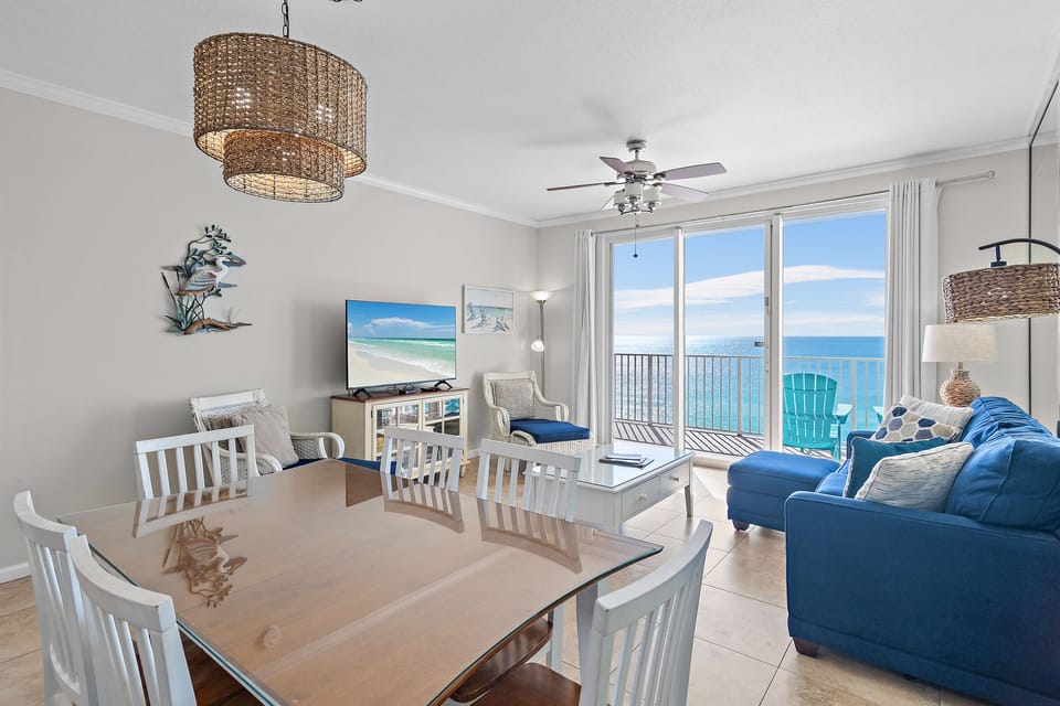 The dining table has room for 6. Gulf front dining from the comfort of your own condo!