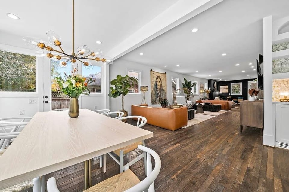 Beautiful open concept flow from Dining to living room areas.