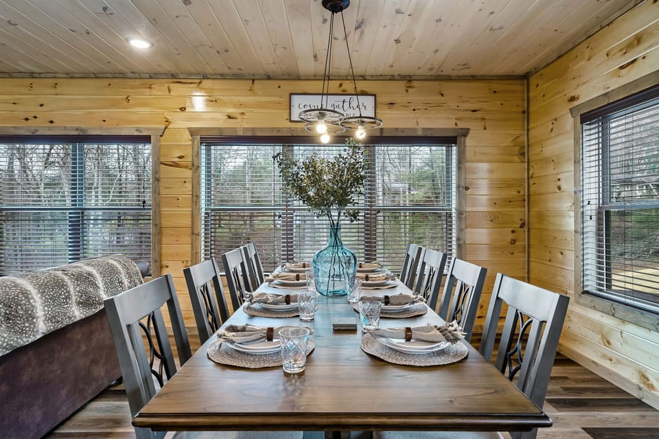Dining table with 8 chairs.  Plenty of room to add bar stools