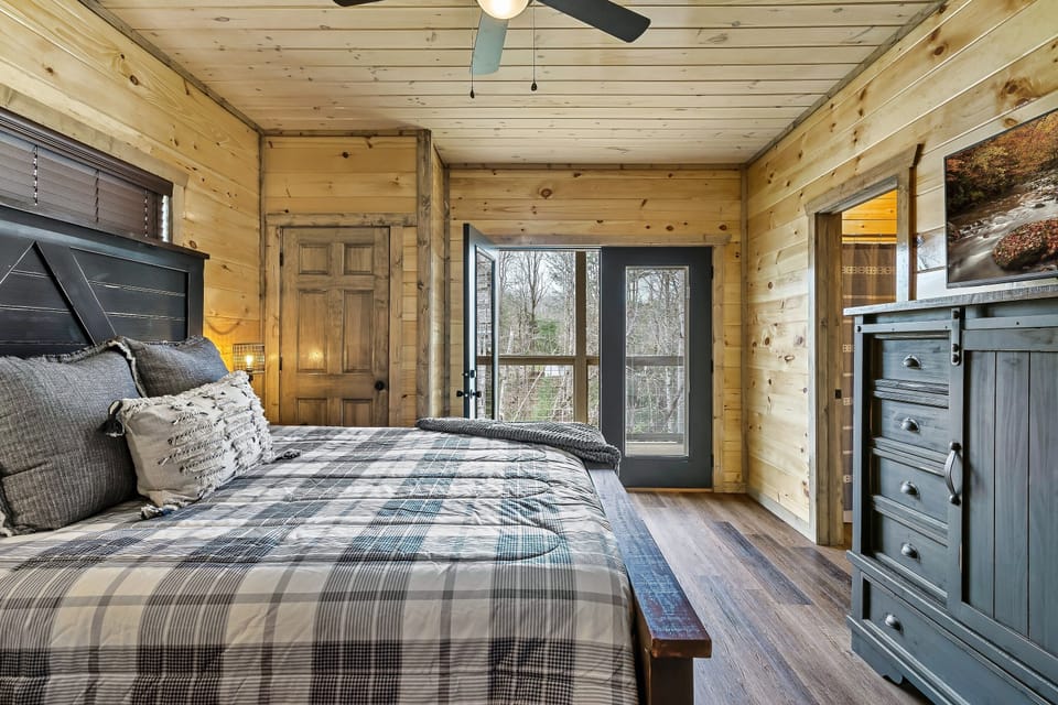 Master Bedroom #1 with King Bed, private bathroom, and private deck access.
