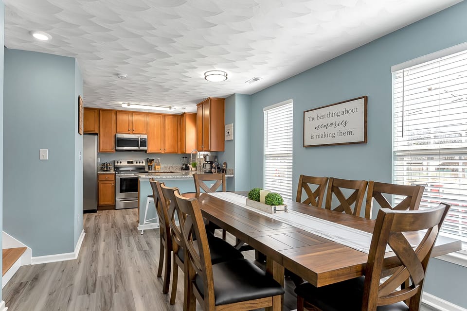 Large dining table with lots of seating