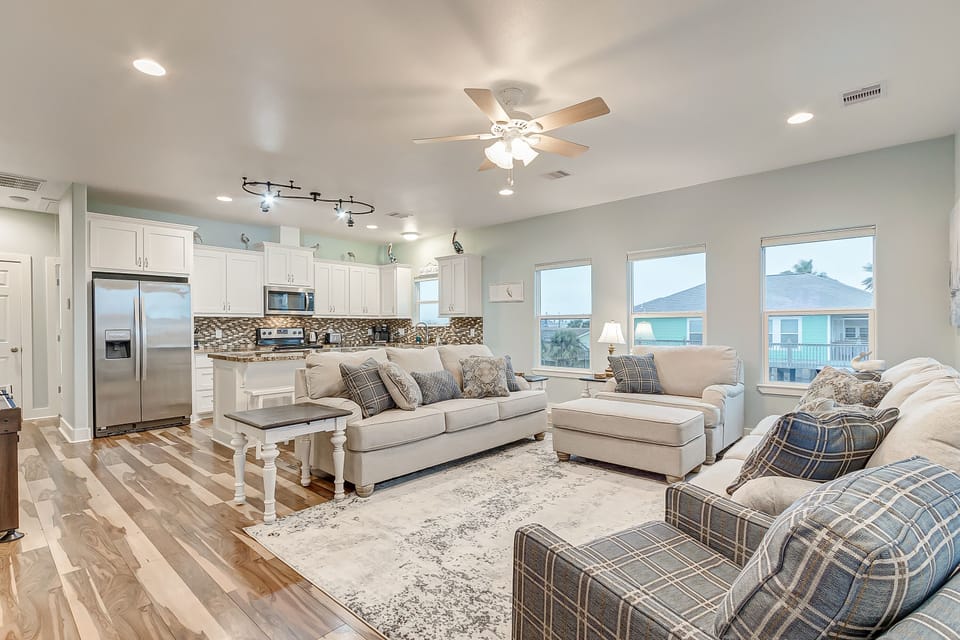 The open floor concept connects the living room and kitchen. 