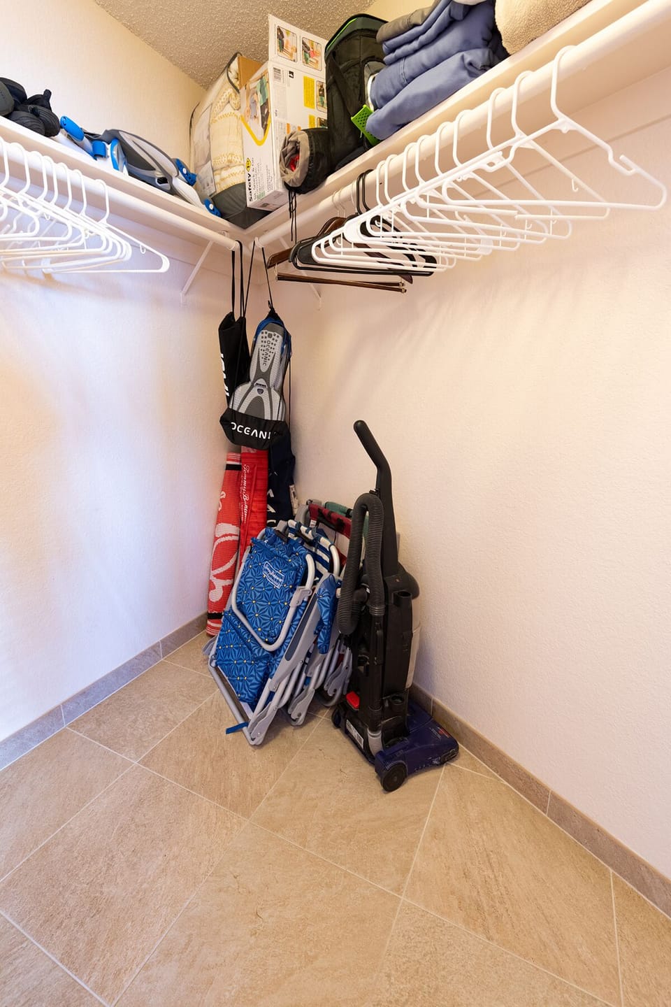 Large Master Suite closet with beach chairs, umbrellas, snorkels, masks and beach towels for your use