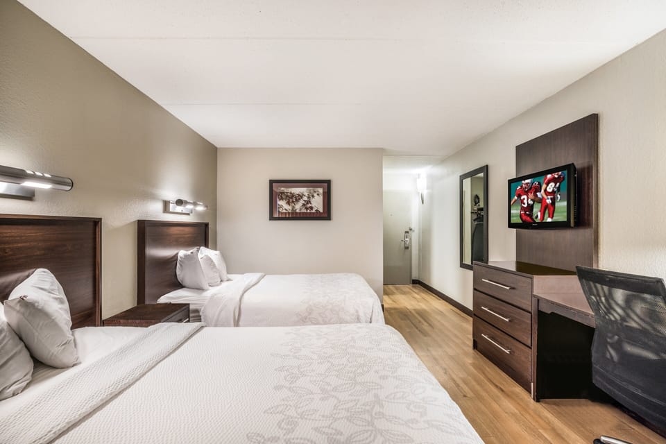 Kick back with in-room entertainment and plenty of storage space.