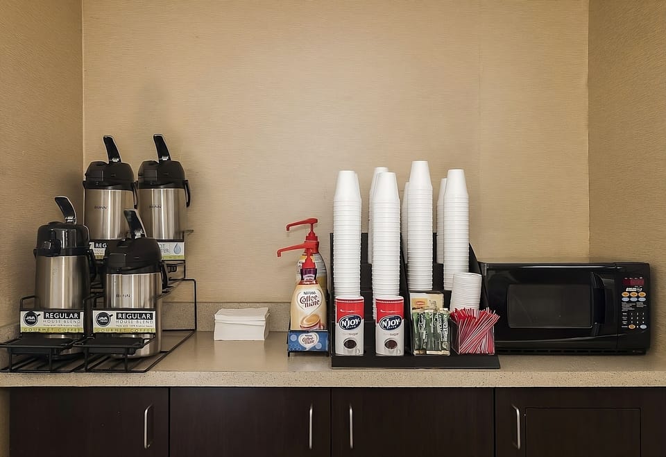 Start your morning with fresh coffee, creamers, and snacks.