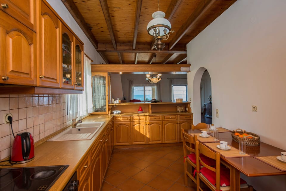 Frosos Beachfront Maisonette Acharavi Kitchen And Dining Area