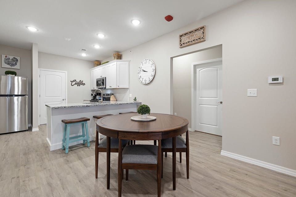 Dining space with seating for your group — perfect for meals, games, or morning coffee