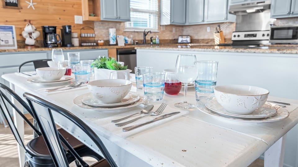 Spacious dining area that comfortably seats 8, ideal for group meals and gatherings.