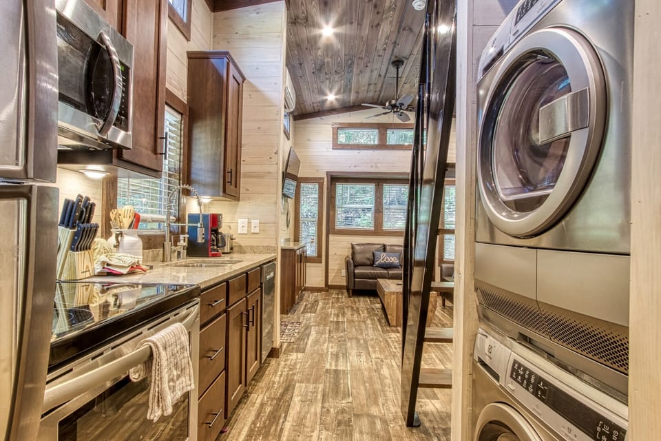 Kitchen area with washer and dryer 