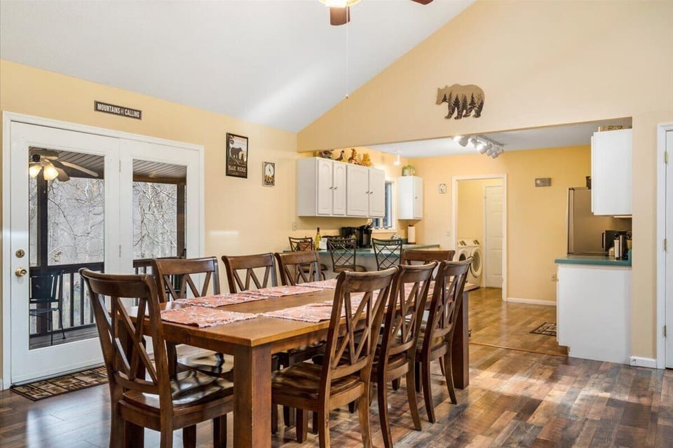 Dining Area to Kitchen and Screened Porch
