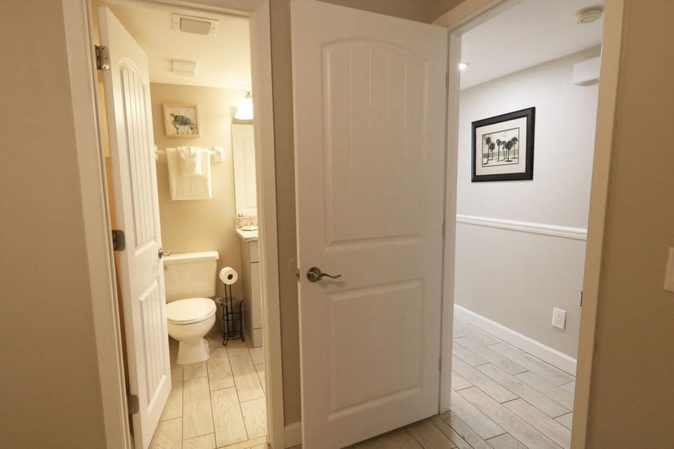 Bathroom connects to second bedroom and hallway