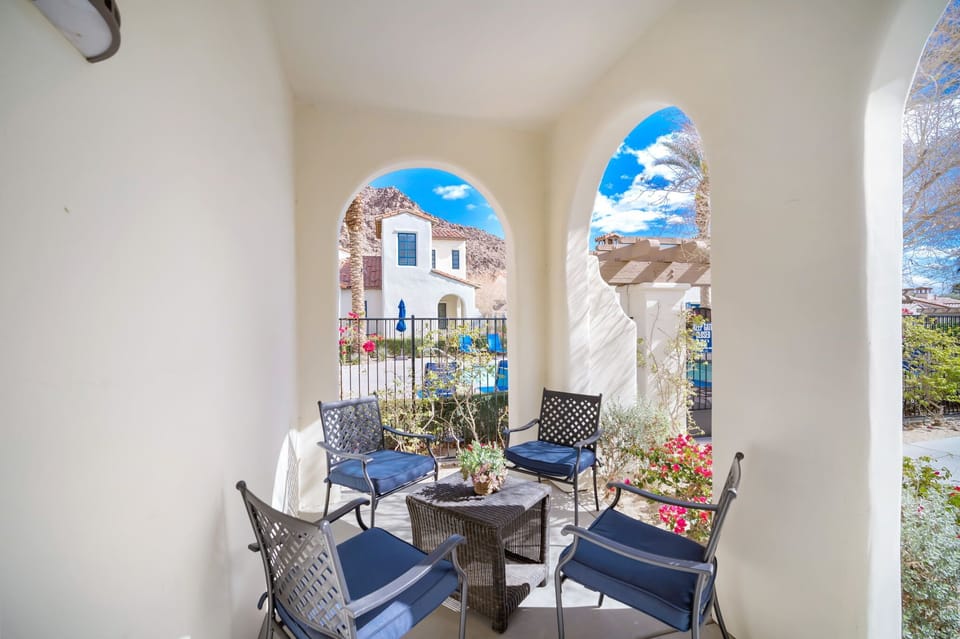 Front porch has direct views of the pool.