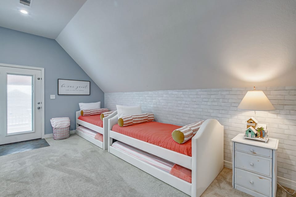 The Lookout Loft has 2 twins with 2 trundles; looks down over living area.  