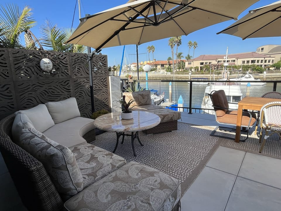 Lots of outdoor seating with lit umbrellas to extend your enjoyment.