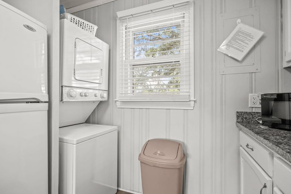 stackable washer/dryer in kitchen.