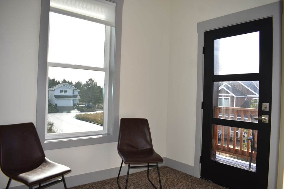 Primary Bedroom, King bed- sitting area & balcony door