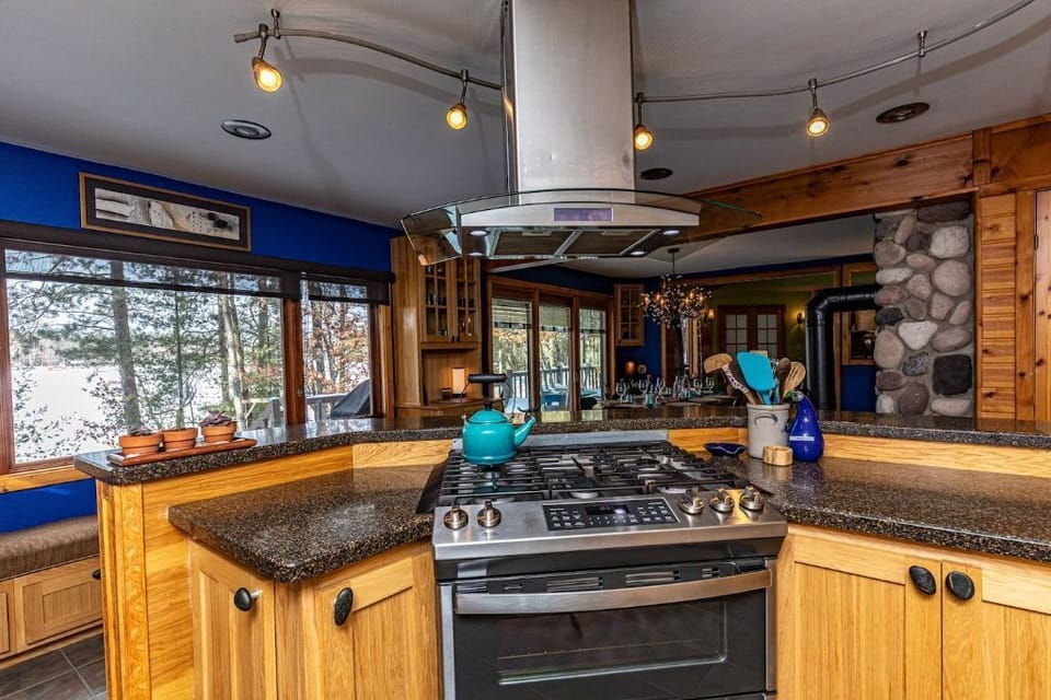Large well equipped kitchen with dual stove.