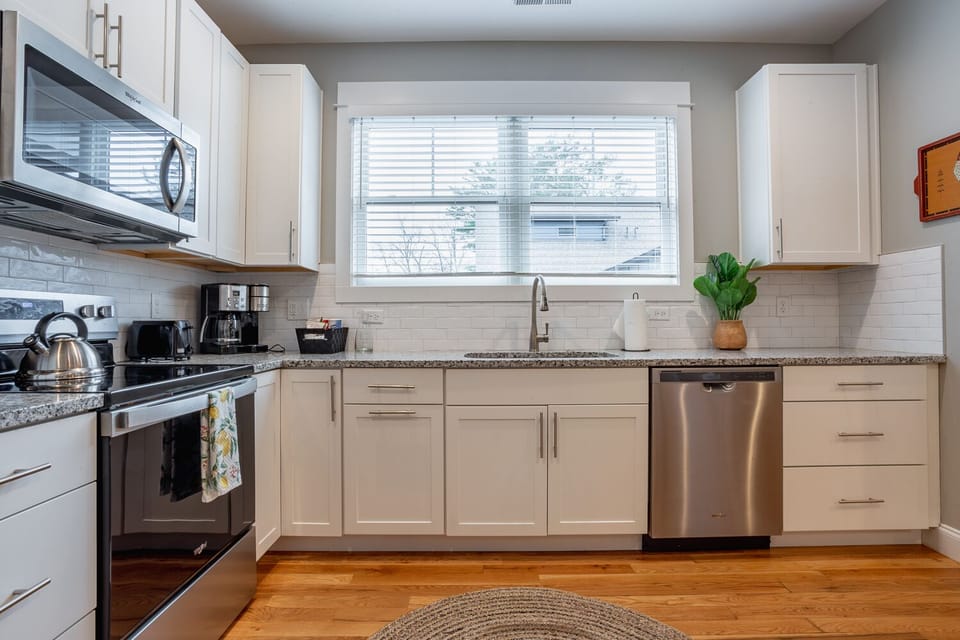 Kitchen is equipped w/ Smooth Top Electric Range