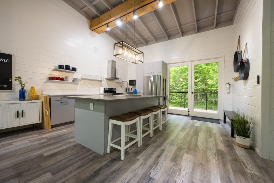 Facing kitchen and back porch entry.