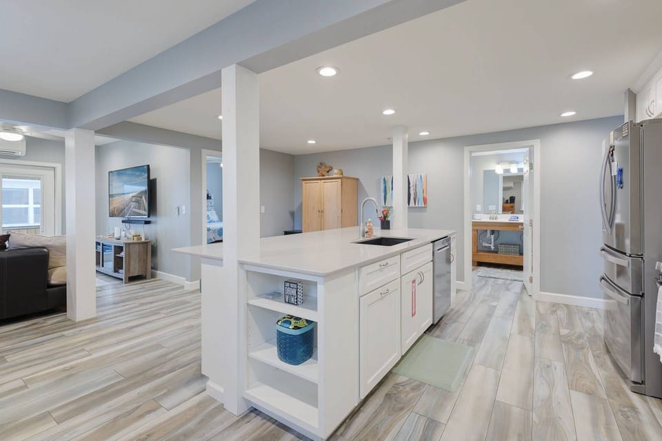 Open Kitchen / Living Area with Stainless Steel Appliances