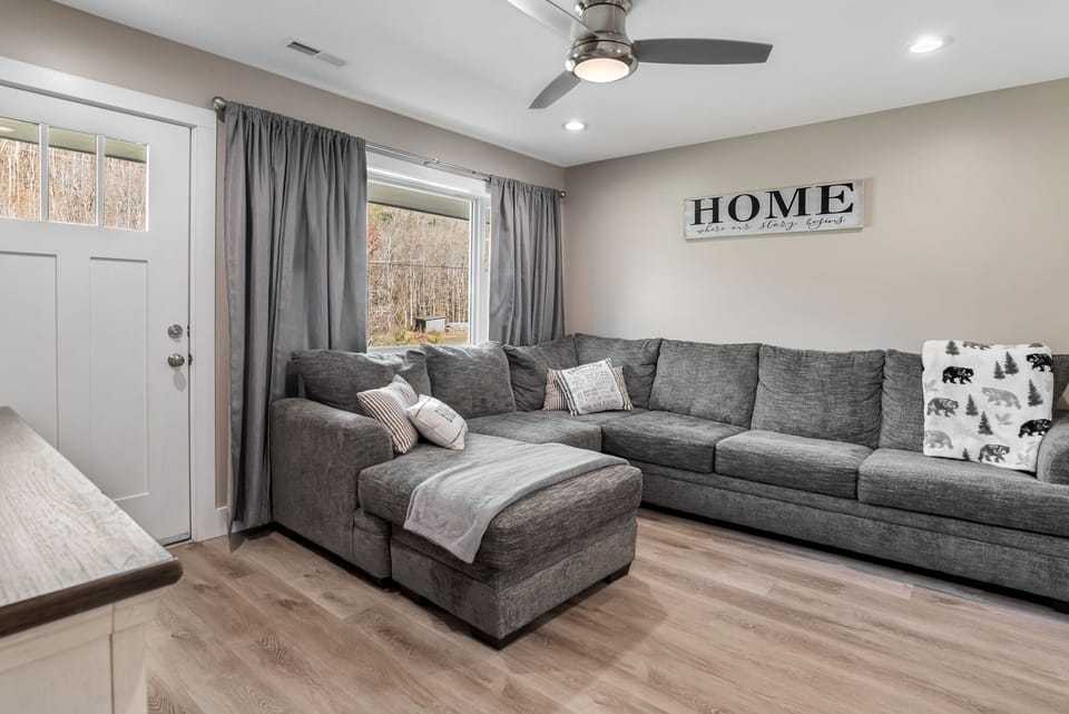 Living room - comfortable sectional, with upgraded pull out bed.