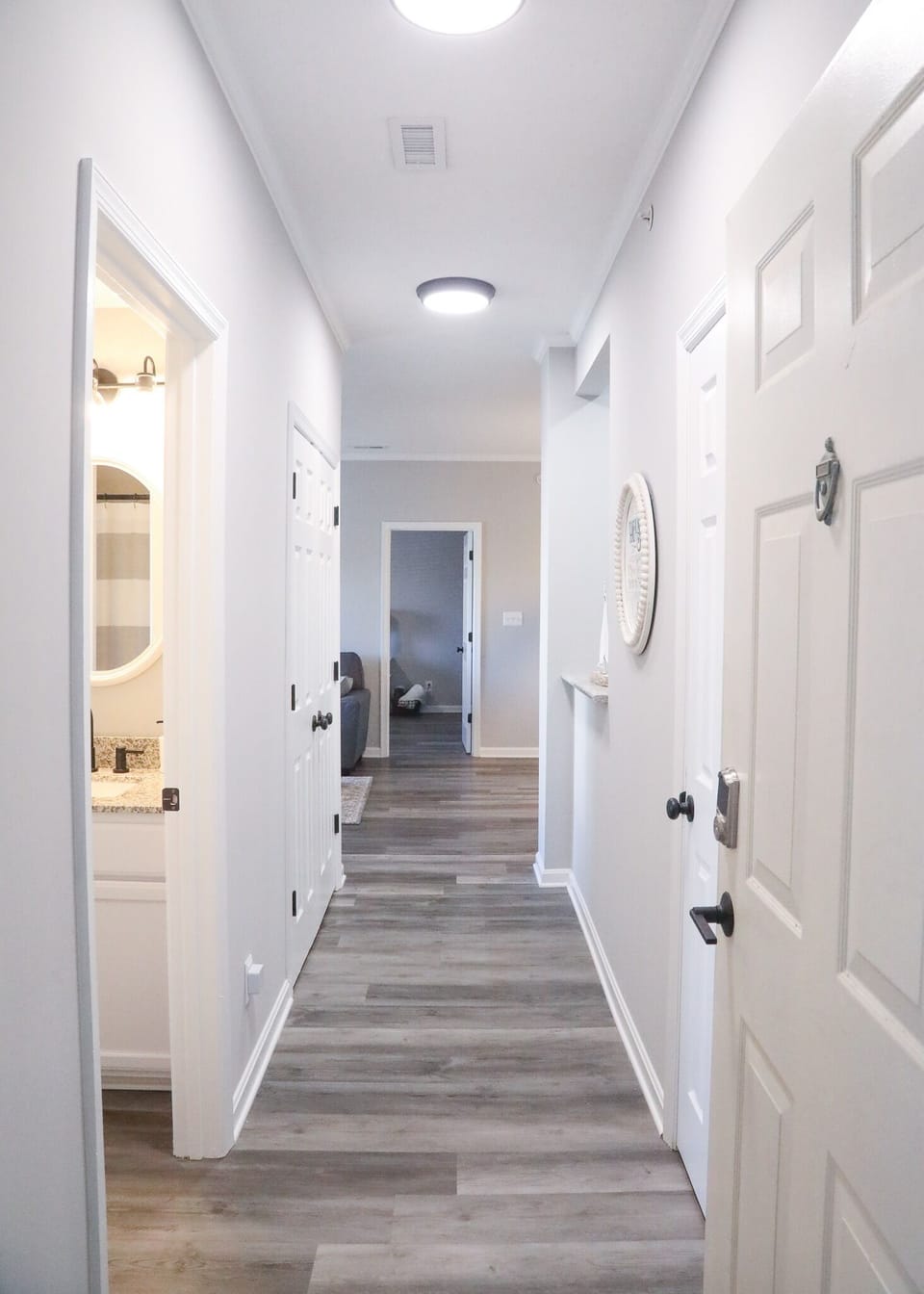 Entry way. Hall closet plus entrance to the hall bathroom. 