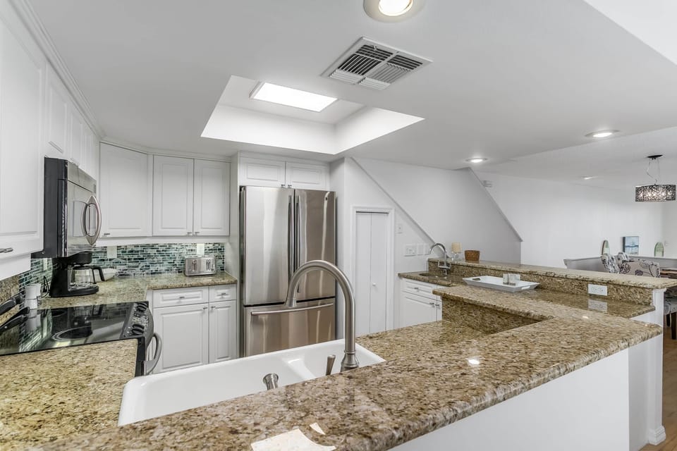 Kitchen is open to dining area.