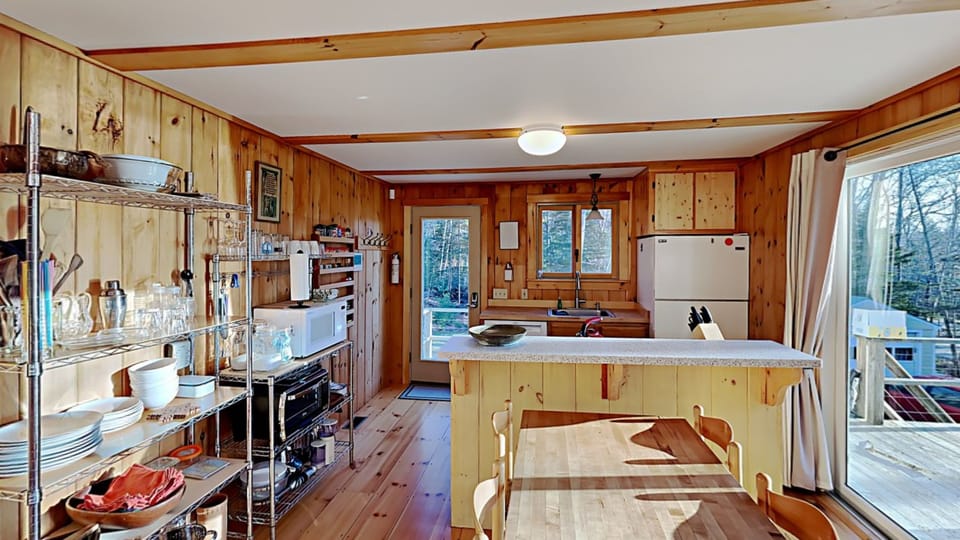 The kitchen is small, but mighty.  It has everything you need to make great meals.
