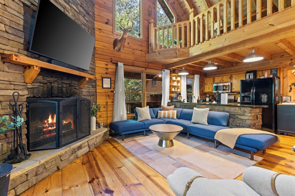 The heart of the party—kitchen, living room, and patio in one inviting space