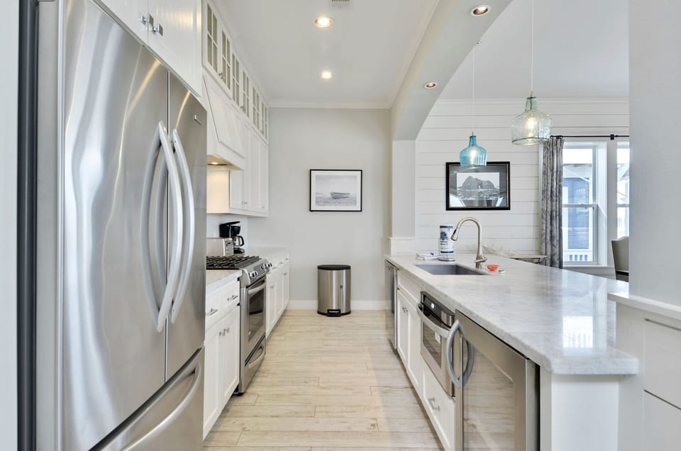 Stainless-steel Means Guest Appeal - The stainless-steel fixtures and appliances add both beauty and function to the kitchen.