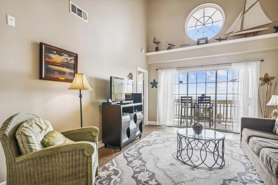 Easy Access - The living room provides quick and easy access to the patio where you can sit and enjoy your surroundings.