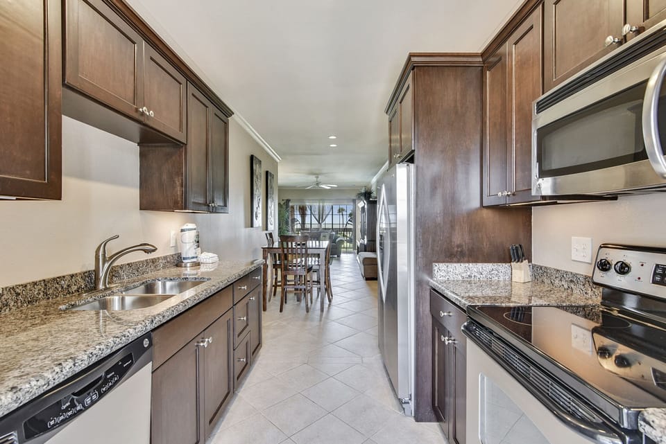 Stay Connected - With the dining table conveniently located next to all of the action, it's easy to stay engaged with friends and family while grabbing a quick bite to eat.