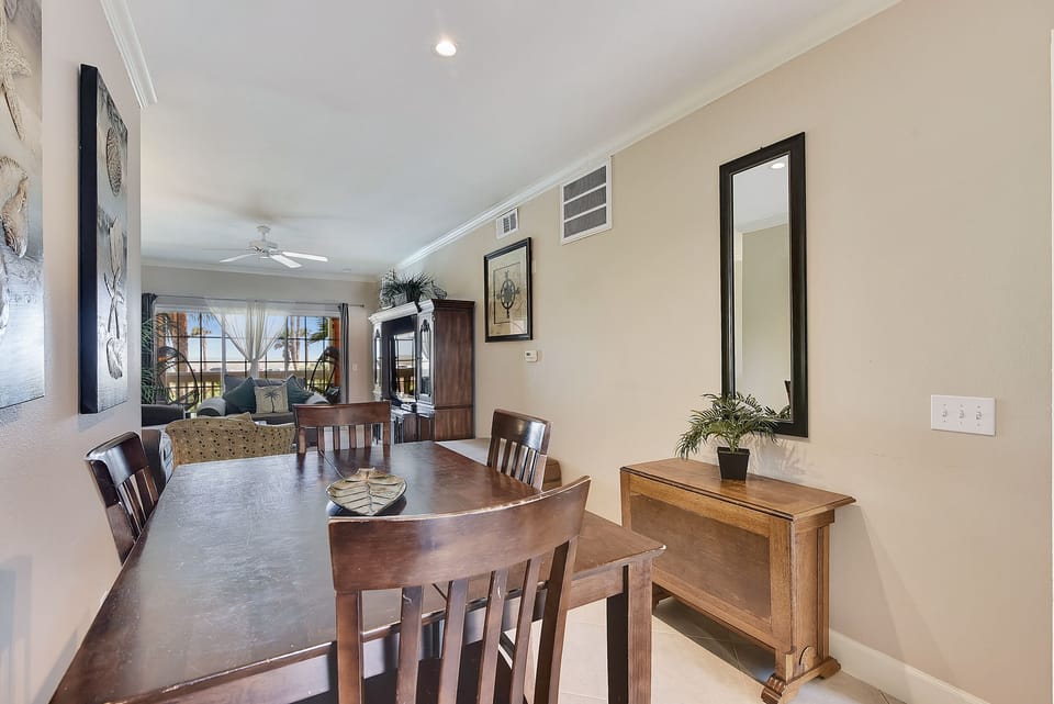 Elegant Dining - The beautiful dining table is the perfect place to gather your guests for an extravagant meal. The chairs are so comfortable. It’s hard to imagine a more elegant setting.