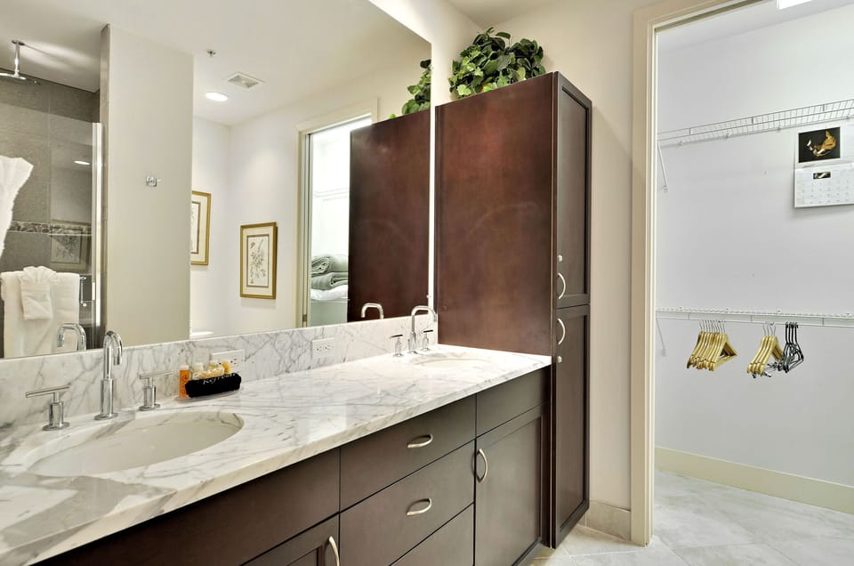 First Bathroom (Primary) - Dual Vanity + Walk-In Shower